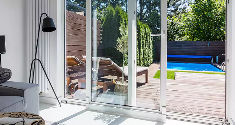 Fixing A Sliding Screen Door Roller in Estero, FL